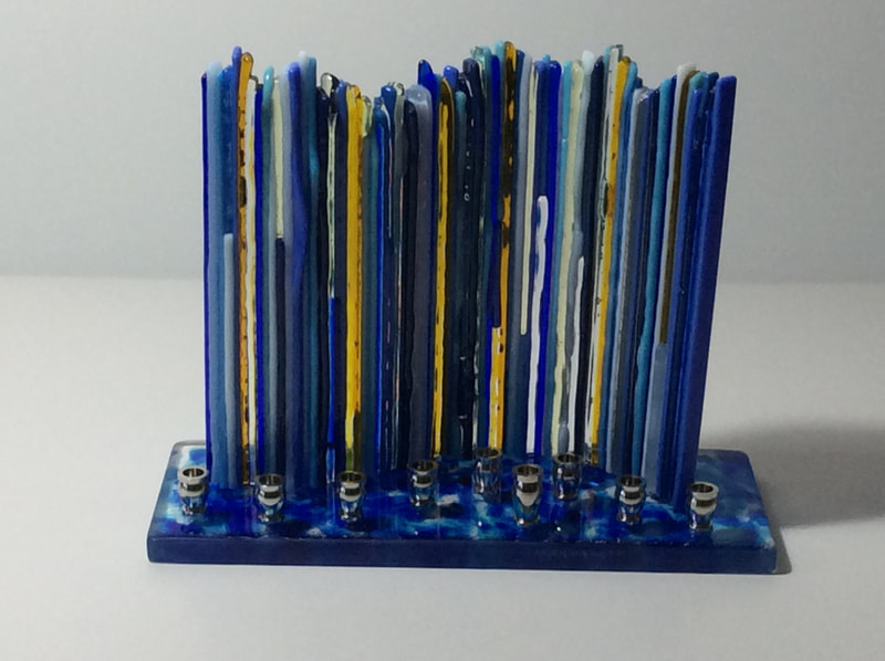 fused glass menorah created with glass strips